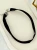 Klasyczny czarny choker z delikatną zawieszką