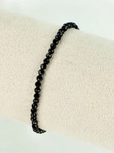 Elegancka bransoletka z fasetowanych czarnych kamieni