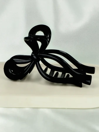 Elegancka spinka do włosów z motywem kokardy