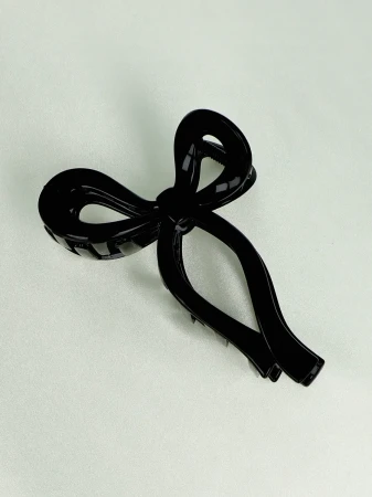 Elegancka spinka do włosów z motywem kokardy