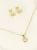 Elegancki zestaw biżuterii w kolorze złotym z kwadratowymi cyrkoniami